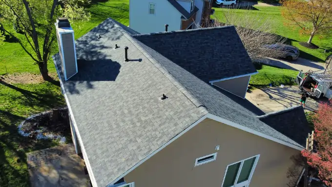 Satisfied homeowners in front of their newly replaced roof in Dixie - Berryhill, Belmont NC